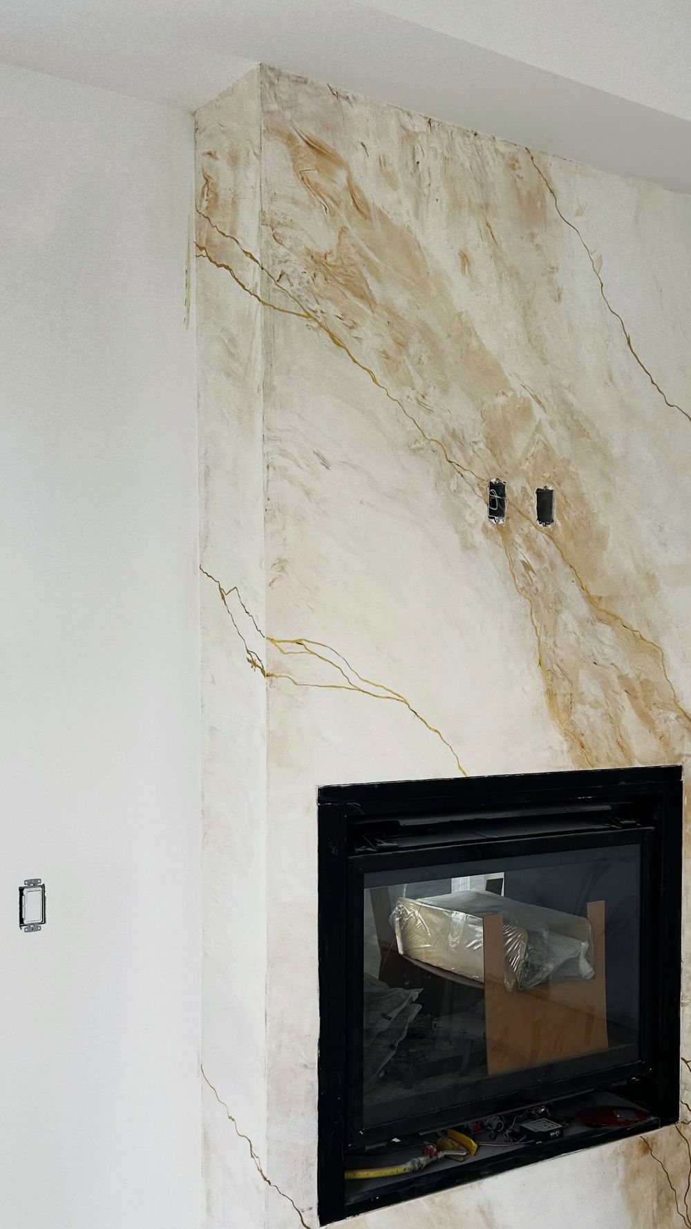 Marble-finish fireplace surround